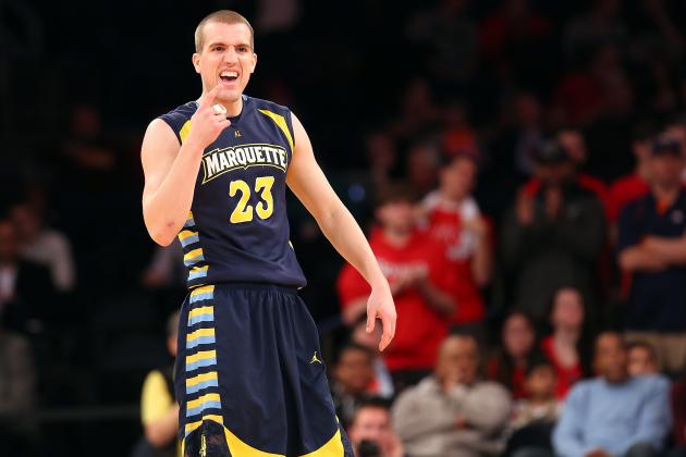 NEW YORK, NY - FEBRUARY 1:  Jake Thomas #23 of the Marquette Golden Eagles gestures to teamates from the court during the game against the St. John's Red Storm at Madison Square Garden on February 1, 2014 in New York City. (Photo by Nate Shron/Getty Images)