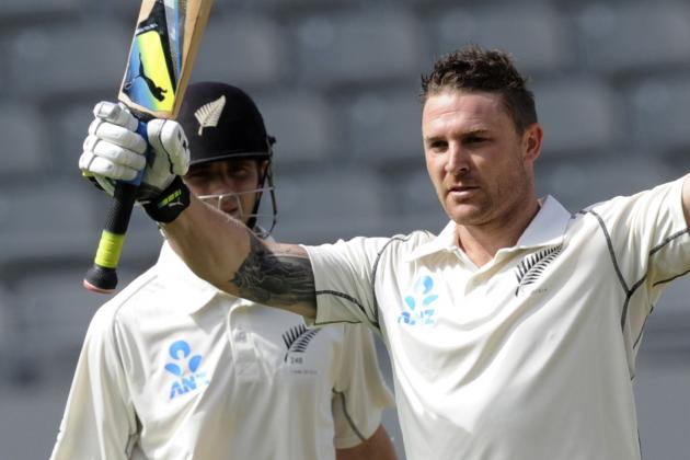 New Zealand’s Brendon McCullum celebrates his century against India on the first day of the first cricket test at Eden Park in Auckland, New Zealand, Thursday, Feb. 6, 2014. (AP Photo/SNPA, Ross Setford) NEW ZEALAND OUT