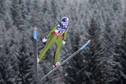 Sarah Hendrickson of the United States  soars through the air during the women's ski jumping HS 106 Individual at the Nordic Ski World Championships in Val di Fiemme, Italy, Friday, Feb. 22, 2013.  (AP Photo/Matthias Schrader)