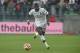 AC Milan's forward Mbaye Niang runs with the ball during his international friendly soccer match against Caen at the Michel d’Ornano stadium in Caen, western France, Sunday, Oct. 13, 2013. (AP Photo/David Vincent)