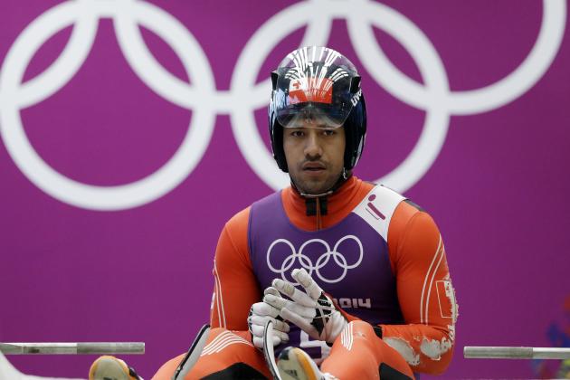 Bruno Banani of Tonga prepares to start a run during a training session for the men's singles luge at the 2014 Winter Olympics, Thursday, Feb. 6, 2014, in Krasnaya Polyana, Russia. (AP Photo/Dita Alangkara)