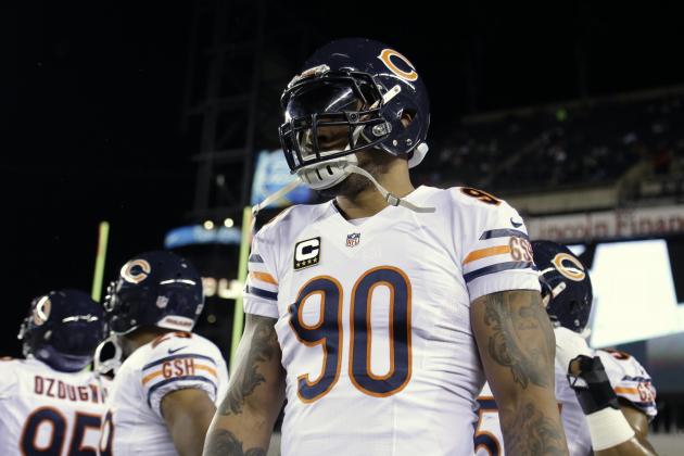 Chicago Bears' Julius Peppers warms up before an NFL football game against the Philadelphia Eagles, Sunday, Dec. 22, 2013, in Philadelphia. (AP Photo/Matt Rourke)
