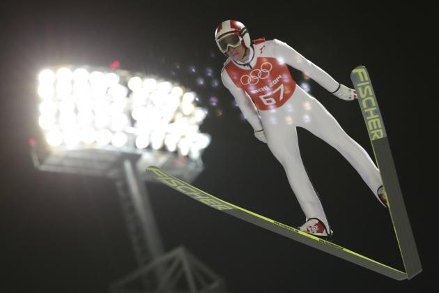 Austria's Gregor  Schlierenzauer makes an attempt in the men's normal hill ski jumping training at the 2014 Winter Olympics, Thursday, Feb. 6, 2014, in Krasnaya Polyana, Russia. (AP Photo/Matthias Schrader)