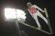 Austria's Gregor Schlierenzauer makes an attempt in the men's normal hill ski jumping training at the 2014 Winter Olympics, Thursday, Feb. 6, 2014, in Krasnaya Polyana, Russia. (AP Photo/Matthias Schrader)