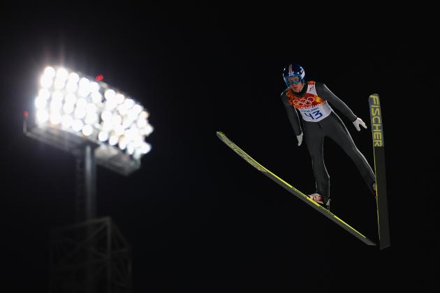 SOCHI, RUSSIA - FEBRUARY 08: Michael Hayboeck of Austria jumps during the Men's Normal Hill Individual Qualification on day 1 of the Sochi 2014 Winter Olympics at the RusSki Gorki Ski Jumping Center on February 8, 2014 in Sochi, Russia.  (Photo by Lars Baron/Getty Images)