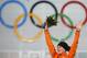 Ireen Wust of the Netherlands celebrates winning gold during the flower ceremony for the women's 3,000-meter speedskating race at the Adler Arena Skating Center during the 2014 Winter Olympics, Sunday, Feb. 9, 2014, in Sochi, Russia. (AP Photo/Pavel Golovkin)