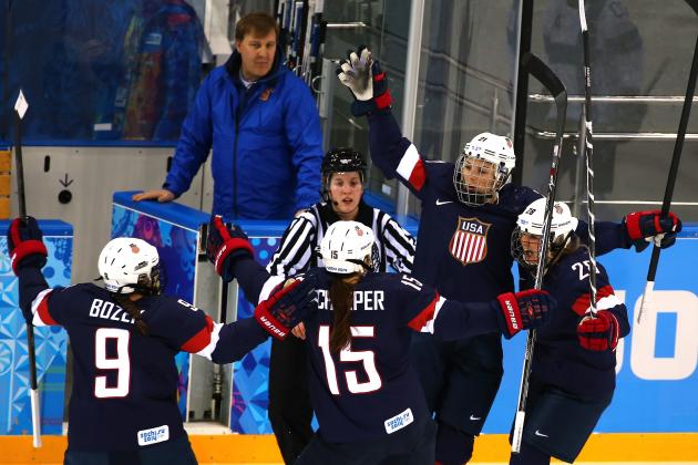 SOCHI, RUSSIA - FEBRUARY 08:  Hilary Knight #21 of United States celebrates with her teammates after scoring a goal on Noora Raty #41 of Finland in the first period to during the Women's Ice Hockey Preliminary Round Group A Game on day 1 of the Sochi 2014 Winter Olympics at Shayba Arena on February 8, 2014 in Sochi, Russia.  (Photo by Martin Rose/Getty Images)