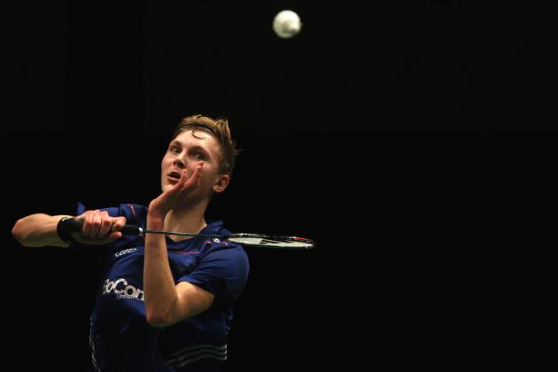 KUALA LUMPUR, MALAYSIA - JANUARY 15:  Viktor Axelsen of Denmark in action against Kento Momota of Japan during day two of the Men's Singles of the Malaysia Badminton Open at the Putra Indoor Stadium on January 15, 2014 in Kuala Lumpur, Malaysia.  (Photo by Stanley Chou/Getty Images)