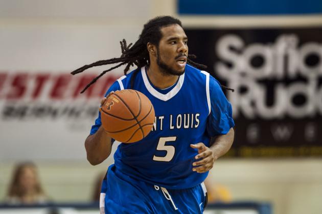 Feb 8, 2014; Philadelphia, PA, USA; Saint Louis Billikens guard Jordair Jett (5) brings the ball up court during the second half against the La Salle Explorers at Tom Gola Arena. St. Louis defeated La Salle 65-63. Mandatory Credit: Howard Smith-USA TODAY Sports