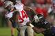 EVANSTON, IL - OCTOBER 05: Carlos Hyde #34 of the Ohio State Buckeyes breaks away from Traveon Henry #10 of the Northwestern Wilcats to score a second half touchdown at Ryan Field on October 5, 2013 in Evanston, Illinois. Ohio State defeated Northwestern 40-30. (Photo by Jonathan Daniel/Getty Images)