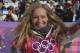 Jamie Anderson of the United States celebrates after winning the women's snowboard slopestyle final at the 2014 Winter Olympics, Sunday, Feb. 9, 2014, in Krasnaya Polyana, Russia. (AP Photo/Sergei Grits)