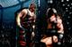 Kane and Triple H battle inside the Elimination Chamber.