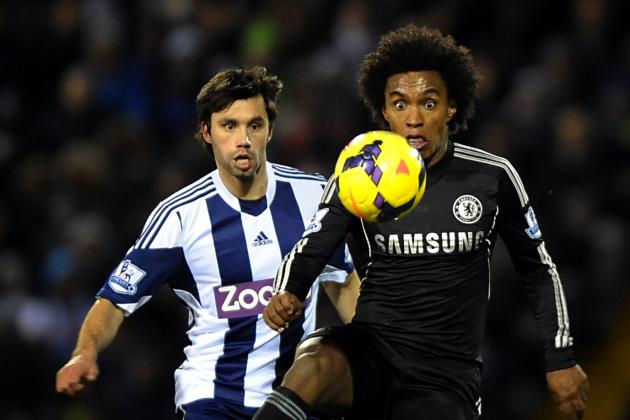 Chelsea's Willian, right, competes for the ball with Bromwich Albion's Claudio Yacob during their English Premier League soccer match between West Bromwich Albion and Chelsea at The Hawthorns Stadium in West Bromwich, England, Tuesday, Feb. 11, 2014. (AP Photo/Rui Vieira)