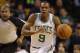 Boston Celtics point guard Rajon Rondo (9) brings the ball up court during the first half of their NBA basketball game against the Dallas Mavericks in Boston, Sunday, Feb. 9, 2014. The Mavericks defeated the Celtics 102-91. The Mavericks defeated the Celtics 102-91. (AP Photo/Stephan Savoia)