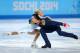 SOCHI, RUSSIA - FEBRUARY 11: Tatiana Volosozhar and Maxim Trankov of Russia compete during the Figure Skating Pairs Short Program on day four of the Sochi 2014 Winter Olympics at Iceberg Skating Palace on February 11, 2014 in Sochi, Russia. (Photo by Paul Gilham/Getty Images)