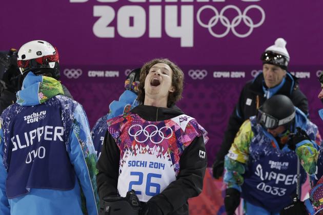 Switzerland's Iouri Podladtchikov celebrates after his half pipe run during the men's snowboard halfpipe final at the Rosa Khutor Extreme Park, at the 2014 Winter Olympics, Tuesday, Feb. 11, 2014, in Krasnaya Polyana, Russia. Podladtchikov won the gold medal. (AP Photo/Andy Wong)