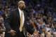 New York Knicks head coch Mike Woodson shouts in the first quarter of an NBA basketball game against the Oklahoma City Thunder in Oklahoma City, Sunday, Feb. 9, 2014. (AP Photo/Sue Ogrocki)