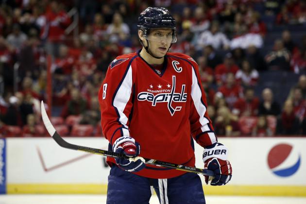 Washington Capitals right wing Alex Ovechkin (8), from Russia, skates on the ice in the first period of an NHL hockey game against the Detroit Red Wings, Sunday, Feb. 2, 2014, in Washington. (AP Photo/Alex Brandon)