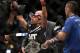 Jose Aldo, left of Brazil celebrates after beating Ricardo Lamas of Chicago, IL in five rounds of the Ultimate Fighting Featherweight Championship Mix Martial Arts bout in Newark, N.J. on Saturday, Feb. 1, 2014. Aldo won by unanimous decision in five rounds. (AP Photo/Tim Larsen)
