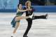 Meryl Davis and Charlie White of the United States compete in the team free ice dance figure skating competition at the Iceberg Skating Palace during 2014 Winter Olympics, Sunday, Feb. 9, 2014, in Sochi, Russia. (AP Photo/Ivan Sekretarev)