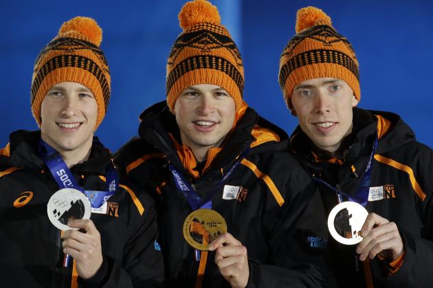 Men’s 5,000-meter speedskating medalists from the Netherlands, from left, Jan Blokhuijsen, silver, Sven Kramer, gold, and Jorrit Bergsma, bronze, pose during their medals ceremony at the 2014 Winter Olympics, Sunday, Feb. 9, 2014, in Sochi, Russia. (AP Photo/Morry Gash)