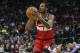 Feb 12, 2014; Houston, TX, USA; Washington Wizards small forward Trevor Ariza (1) shoots during the third quarter against the Houston Rockets at Toyota Center. The Rockets defeated the Wizards 113-112. Mandatory Credit: Troy Taormina-USA TODAY Sports