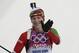 Belarus' Darya Domracheva celebrates winning the gold during the women's 15K individual biathlon race at the 2014 Winter Olympics, Friday, Feb. 14, 2014, in Krasnaya Polyana, Russia. (AP Photo/Matthias Schrader)