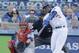 Los Angeles Dodgers' Hanley Ramirez hits a single during the first inning of Game 3 of the National League baseball championship series against the St. Louis Cardinals, Monday, Oct. 14, 2013, in Los Angeles. (AP Photo/Chris Carlson)