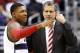 Washington Wizards guard Bradley Beal, left, talks with head coach Randy Wittman in the first half of an NBA basketball game against the Golden State Warriors, Sunday, Jan. 5, 2014, in Washington. The Warriors won 112-96 for the team's ninth win in a row. (AP Photo/Alex Brandon)