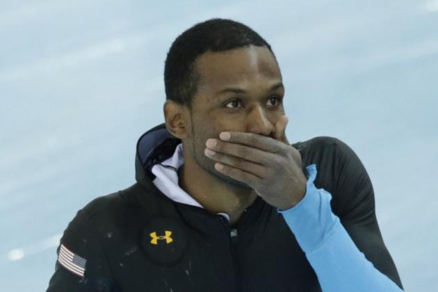 Shani Davis of the U.S. covers his mouth after  competing in the men's 1,500-meter speedskating race at the Adler Arena Skating Center during the 2014 Winter Olympics in Sochi, Russia, Saturday, Feb. 15, 2014. (AP Photo/Matt Dunham)