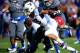 LAWRENCE, KS - NOVEMBER 16: Running back Charles Sims #3 of the West Virginia Mountaineers carries the ball during the game against the Kansas Jayhawks at Memorial Stadium on November 16, 2013 in Lawrence, Kansas. (Photo by Jamie Squire/Getty Images)