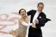 Madison Chock and Evan Bates skate during the ice dance short program at the U.S. Figure Skating Championships in Boston, Friday, Jan. 10, 2014. (AP Photo/Elise Amendola)