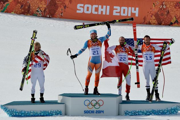 SOCHI, RUSSIA - FEBRUARY 16:  (L-R) Silver medalist Andrew Weibrecht of the United States, gold medalist Kjetil Jansrud of Norway and bronze medalists Jan Hudec of Canada and Bode Miller of the United States celebrate on the podium during the flower ceremony for the Alpine Skiing Men's Super-G on day 9 of the Sochi 2014 Winter Olympics at Rosa Khutor Alpine Center on February 16, 2014 in Sochi, Russia.  (Photo by Pascal Le Segretain/Getty Images)