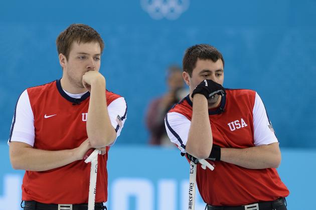 SOCHI, RUSSIA - FEBRUARY 14:  Teammates John Landsteiner (L) and Jared Zezel of the U.S.A compete in the men's round robin session against Germany during day seven of the Sochi 2014 Winter Olympics at Ice Cube Curling Center on February 14, 2014 in Sochi, Russia.  (Photo by Pascal Le Segretain/Getty Images)