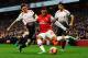 LONDON, ENGLAND - FEBRUARY 16: Alex Oxlade-Chamberlain (R) of Arsenal tries to get his cross in ahead of Joe Allen (L) of Liverpool during the FA Cup Fifth Round match between Arsenal and Liverpool at the Emirates Stadium on February 16, 2014 in London, England. (Photo by Shaun Botterill/Getty Images)