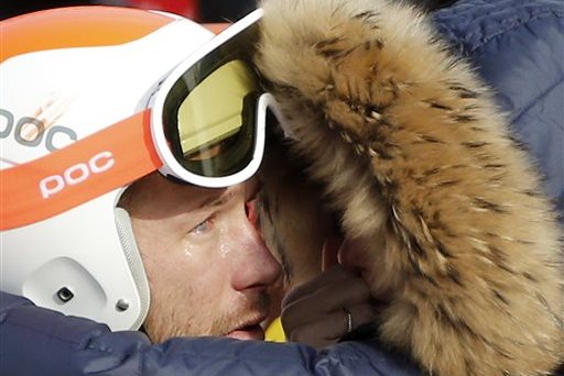 Men's super-G joint bronze medal winner Bode Miller of the United States is consoled by his wife, Morgan, at the Sochi 2014 Winter Olympics, Sunday, Feb. 16, 2014, in Krasnaya Polyana, Russia. (AP Photo/Christophe Ena)