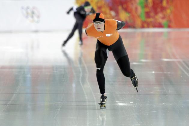 Sven Kramer of the Netherlands, front, and Jonathan Kuck of the U.S. compete in the men's 5,000-meter speedskating race at the Adler Arena Skating Center at the 2014 Winter Olympics in Sochi, Russia, Saturday, Feb. 8, 2014. Kramer set a new Olympic record. (AP Photo/Matt Dunham)