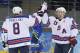 USA forward Phil Kessel, right, celebrates his second goal with teammate Joe Pavelski during the 2014 Winter Olympics men's ice hockey game against Slovenia at Shayba Arena Sunday, Feb. 16, 2014, in Sochi, Russia. (AP Photo/Matt Slocum)
