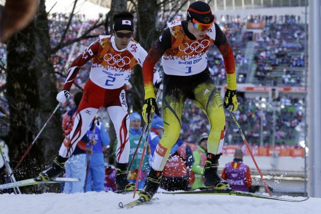 Germany's gold medal winner Eric Frenzel, right, and Japan's silver medal winner Akito Watabe ski during the cross-country portion of the Nordic combined at the 2014 Winter Olympics, Wednesday, Feb. 12, 2014, in Krasnaya Polyana, Russia. (AP Photo/Gregorio Borgia)