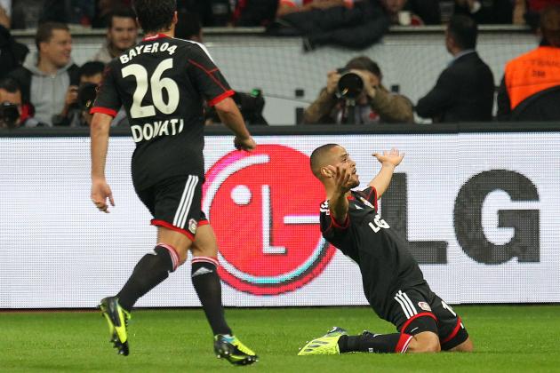 Leverkusen's Sidney Sam, right, celebrates his side's equalizing goal during a German first division Bundesliga soccer match between Bayer Leverkusen and Bayern Munich, in Leverkusen, Germany, Saturday, Oct. 5, 2013. (AP Photo/Michael Probst)