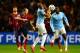 MANCHESTER, ENGLAND - FEBRUARY 18: Andres Iniesta of Barcelona competes with Fernandinho of Manchester City during the UEFA Champions League Round of 16 first leg match between Manchester City and Barcelona at the Etihad Stadium on February 18, 2014 in Manchester, England. (Photo by Laurence Griffiths/Getty Images)