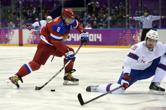 Feb 18, 2014; Sochi, RUSSIA; Russia forward Alex Ovechkin (8) shoots against Norway defenseman Henrik Solberg (39) in a men's ice hockey playoffs qualifications game during the Sochi 2014 Olympic Winter Games at Bolshoy Ice Dome. Mandatory Credit: Scott Rovak-USA TODAY Sports
