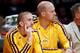 Los Angeles Lakers guard Steve Blake, left, waits on the bench with Lakers center Chris Kaman playing against the Denver Nuggets during an NBA preseason basketball game Sunday, Oct. 6, 2013 in Los Angeles. (AP Photo/Alex Gallardo)