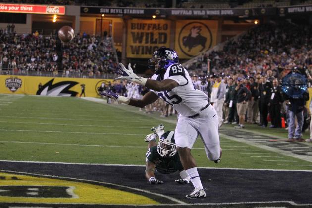 TCU's LaDarius Brown, front against Michigan State's Darqueze Dennard, rear, during the Buffalo Wild Wings Bowl NCAA college football game Saturday, Dec. 29, 2012, in Tempe, Ariz. (AP Photo/Paul Connors)