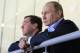 In this Sunday, Feb. 16, 2014 photo, Russian President Vladimir Putin, right, and Prime Minister Dmitry Medvedev watch an ice hockey game between Russia and Slovakia at the 2014 Winter Olympics in Sochi, Russia. (AP Photo/RIA-Novosti, Mikhail Klimentyev, Presidential Press Service)