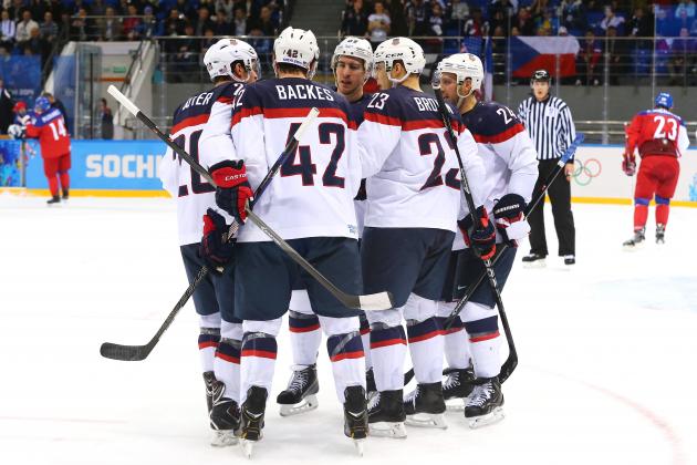 SOCHI, RUSSIA - FEBRUARY 19:  David Backes #42 (2nd L) of the United States celebrates with teammates after scoring his team's third goal against Ondrej Pavelec #31 of the Czech Republic in the first period during the Men's Ice Hockey Quarterfinal Playoff on Day 12 of the 2014 Sochi Winter Olympics at Shayba Arena on February 19, 2014 in Sochi, Russia.  (Photo by Martin Rose/Getty Images)