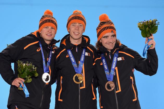 SOCHI, RUSSIA - FEBRUARY 19:  (L-R) Silver medalist Sven Kramer of the Netherlands, gold medalist Jorrit Bergsma of the Netherlands and bronze medalist Bob de Jong of the Netherlands celebrate on the podium during the medal ceremony for the Men's 10000m Speed Skating on day twelve of the Sochi 2014 Winter Olympics at at Medals Plaza on February 19, 2014 in Sochi, Russia.  (Photo by Pascal Le Segretain/Getty Images)