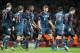 Bayern's Thomas Mueller, center, celebrates his side's second goal during a Champions League, round of 16, first leg soccer match between Arsenal and Bayern Munich at the Emirates stadium in London, Wednesday, Feb. 19, 2014 .(AP Photo/Alastair Grant)