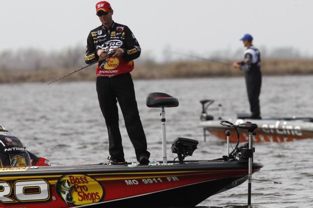 Current leader Kevin VanDam, of Kalamazoo, Mich., foreground, and Keith Combs, of Del Rio, Texas, compete during the Bassmaster Classic during the final round in Lake Cataouatche in Jefferson Parish, La., Sunday, Feb. 20, 2011. (AP Photo/Gerald Herbert)