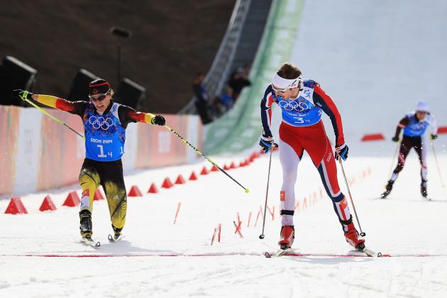SOCHI, RUSSIA - FEBRUARY 20: Joergen Graabak of Norway (R) beats Fabian Riessle of Germany in the Nordic Combined Men's Team 4 x 5 km during day 13 of the Sochi 2014 Winter Olympics at RusSki Gorki Jumping Center on February 20, 2014 in Sochi, Russia. (Photo by Richard Heathcote/Getty Images)